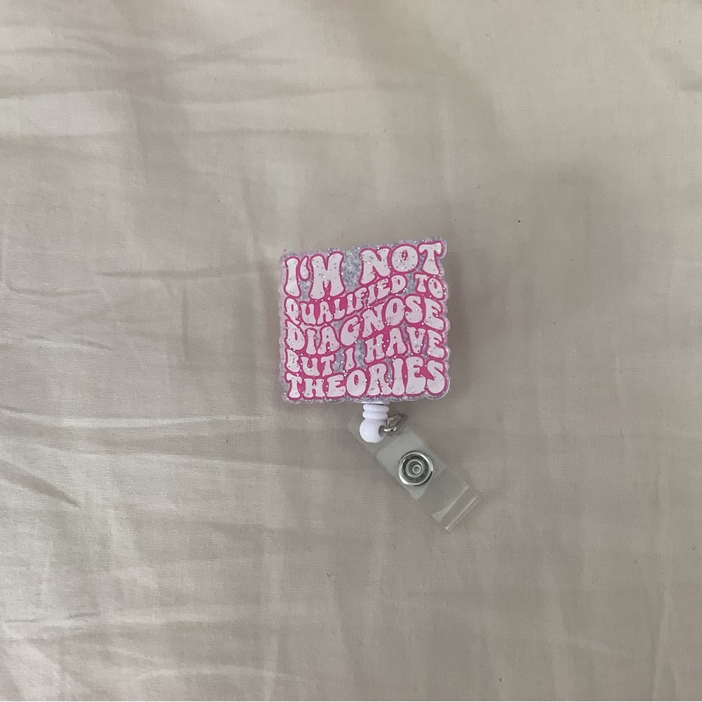 Pink Quote Badge Reel - "I'M NOT QUALIFIED TO DIAGNOSE"